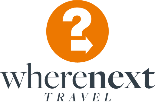 WHERENEXT TRAVEL logo — destination management company in Bogota, Colombia